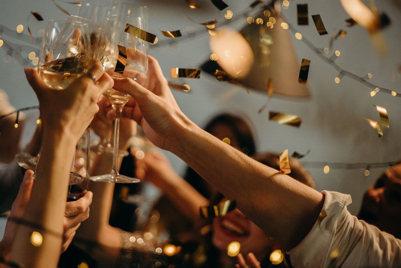 Guests toasting at a nightlife venue
